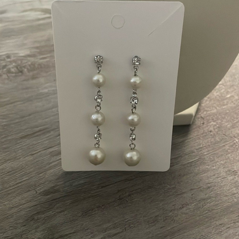 Faux pearl dangle earrings with rhinestones